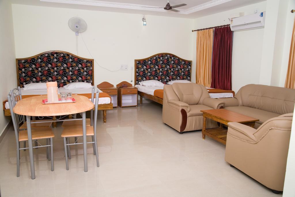 Vihas Inn Тирупати Номер фото