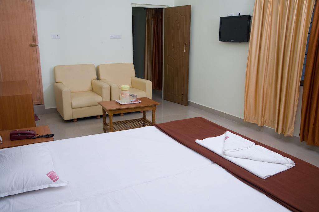 Vihas Inn Тирупати Номер фото